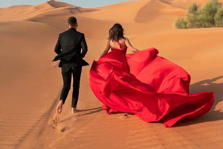 Flying Dress Photography in Desert Dunes of Dubai With Transfers
