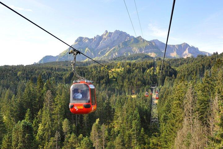 Zurich: Ride the Dragon to Mount Pilatus aboard a Skyglass Bus