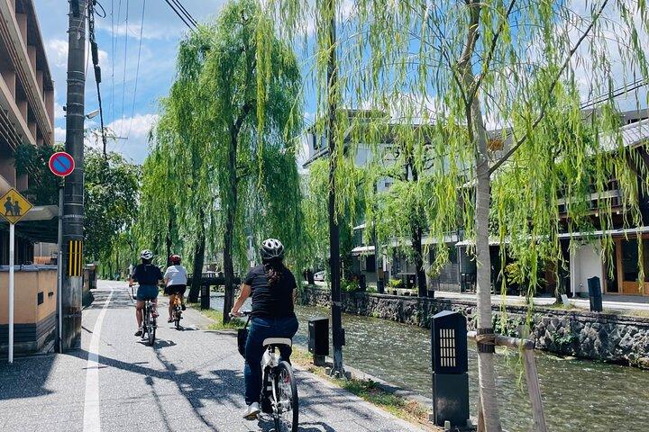 Pedal Adventure Kyoto's iconic landmarks on an e-bike tour