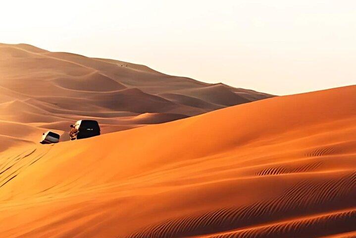 Dubai Half Day Desert Safari With Camel Ride and Quad Bike Option