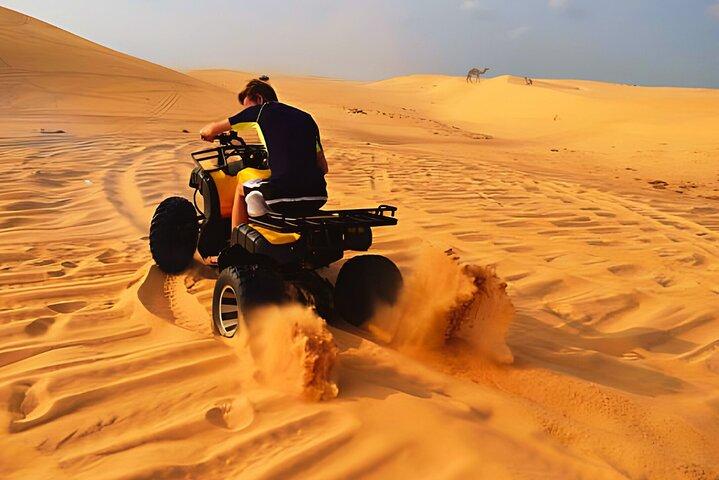 Dubai Half Day Desert Safari With Camel Ride and Quad Bike Option