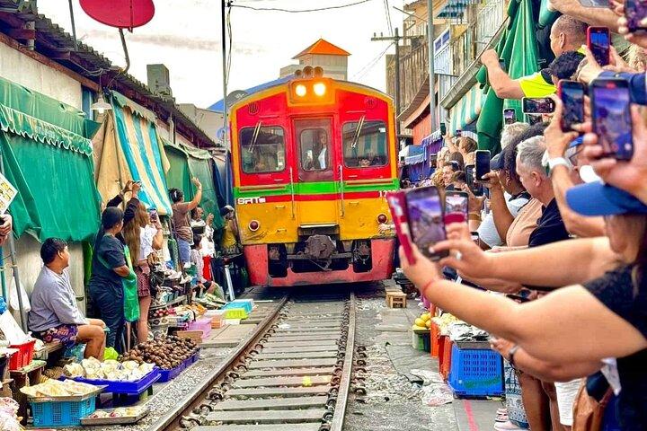 Bangkok Railway Market, Floating Market & Dragon Temple Tour