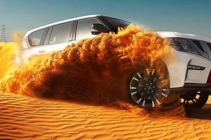 Dubai Desert Safari: Dune Drive Camel & 5* BBQ Shows Stargazing