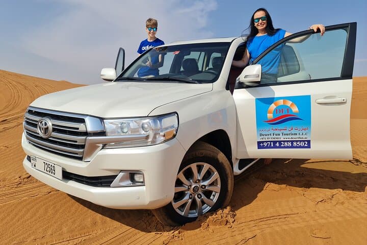 Early Morning Desert Safari Camel Ride, Sandboarding Falcon Photo