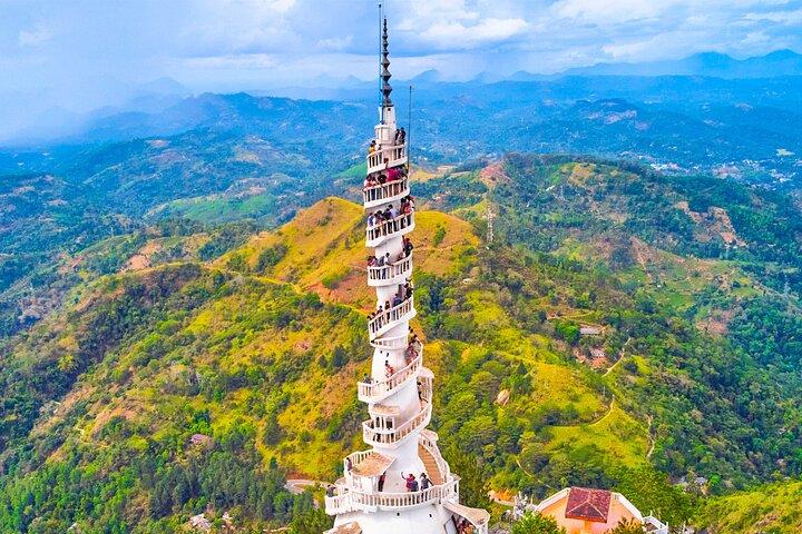 Peradeniya Garden, Ambuluwawa and Pinnawala Day Tour from Kandy