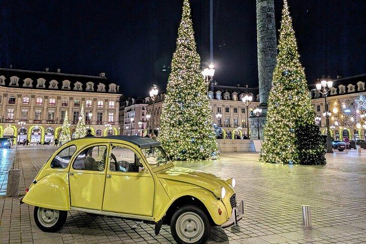 The magical illuminations of Christmas in Paris in an antique car!