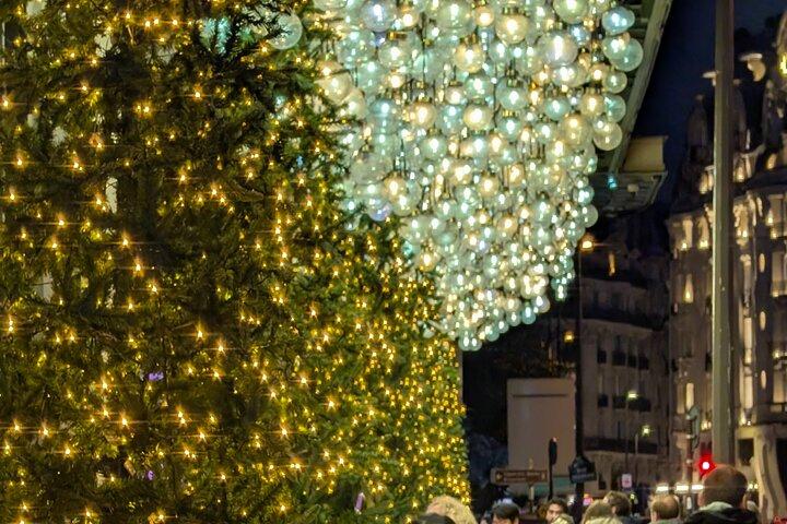 The magical illuminations of Christmas in Paris in an antique car!