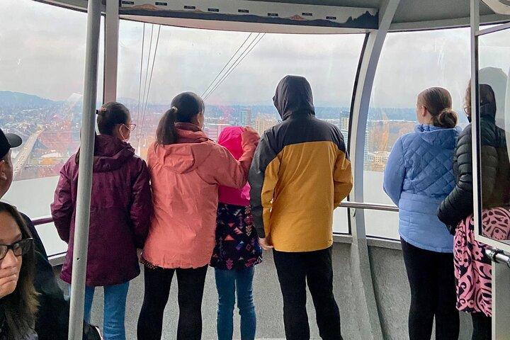 Aerial Tram Ride with Doughnuts near Sunrise in Portland Oregon