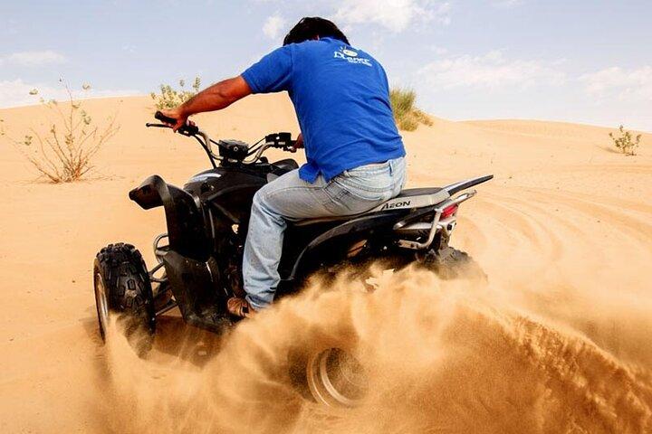 Dubai Desert Safari Tour with Quad Bike for 60mins & BBQ Dinner.