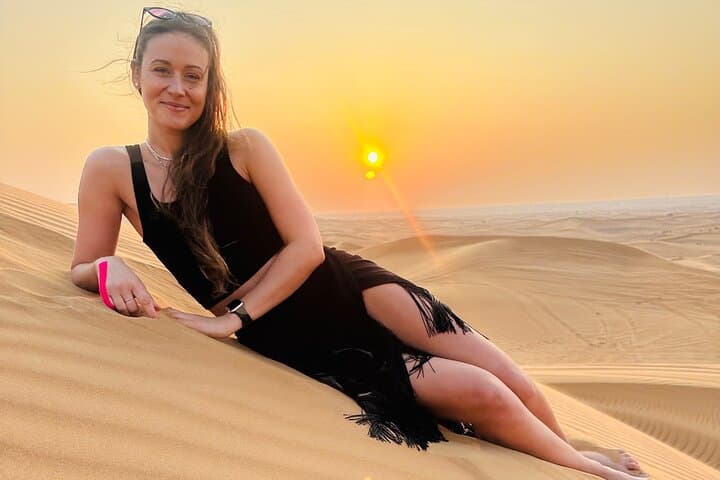 Red Desert safari Dubai with Camel Ride Sand Board & BBQ Dinner
