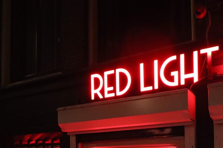 Private red light district & coffeeshop tour with a local
