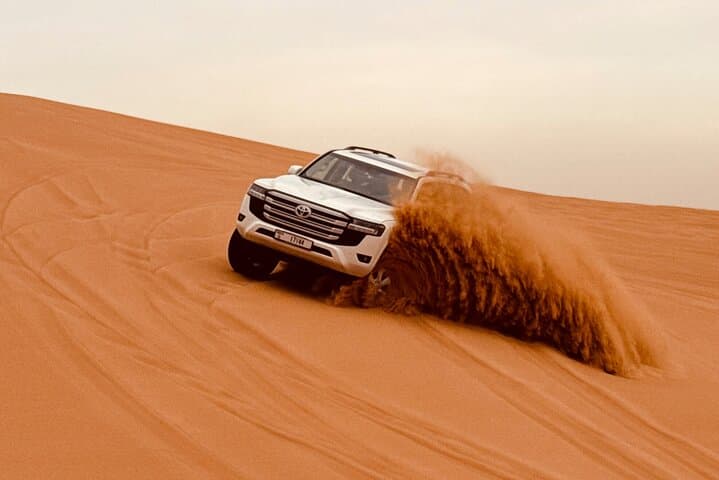 Dubai Sunrise or Sunset Desert Safari Camel Ride Falcon sandboard
