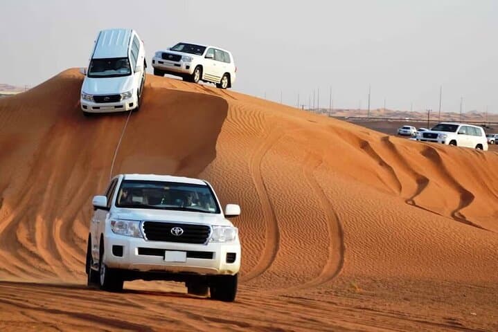 Vip Desert Safari Dubai with Quad bike Camel Riding BBQ Dinner