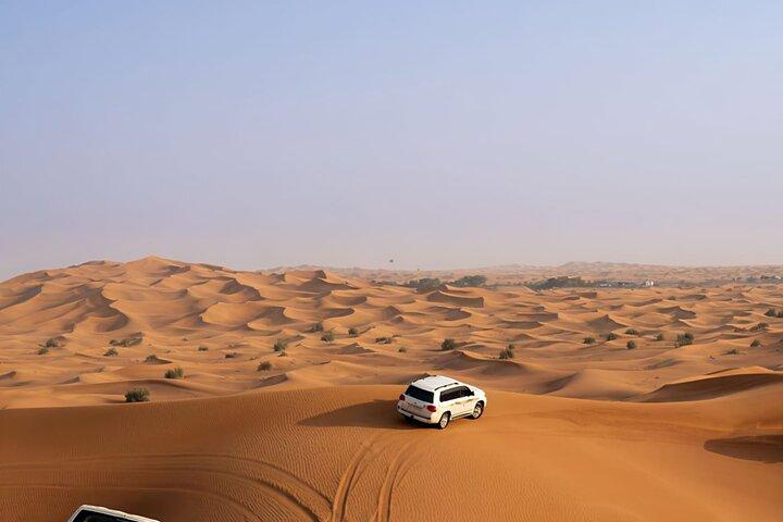 Dubai: Desert Safari, Quad Bike, Camel Ride and Sandboarding