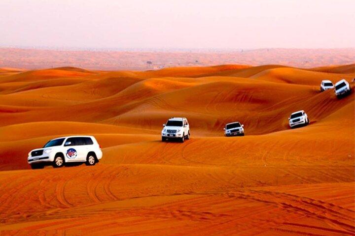 Dubai: Desert Safari, Quad Bike, Camel Ride and Sandboarding