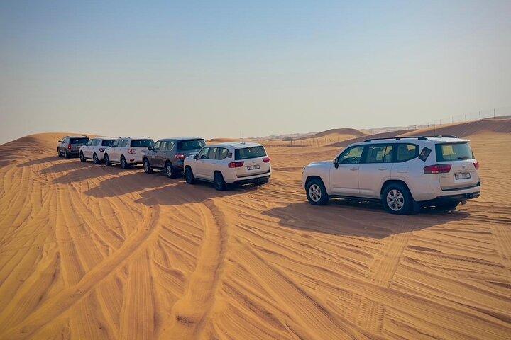 VIP Red Dune Desert Safari with quadbike,4x4 pick/drop,BBQ dinner