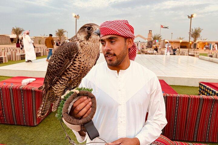 Dubai Morning Desert Safari Red Dune Camel Falcon & Sandboarding