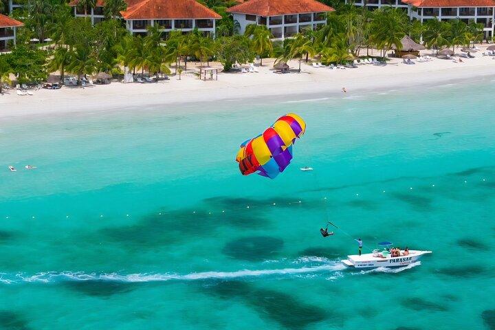 Negrils Seven Miles Beach, Rick's cafe and Parasailing Tour.