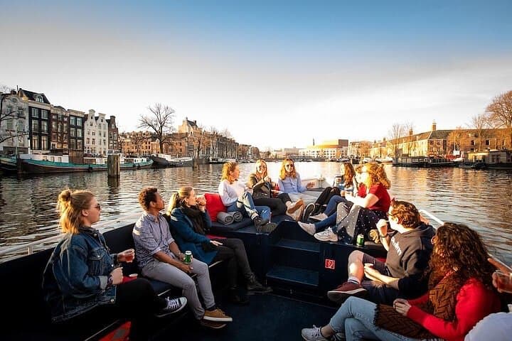 Amsterdam Sunset Canal Cruise with Live Guide and Open Bar