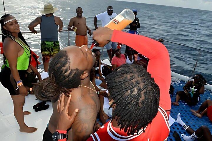 Negril Catamaran Sunset Cruise with Snorkeling, Drinks & DJ