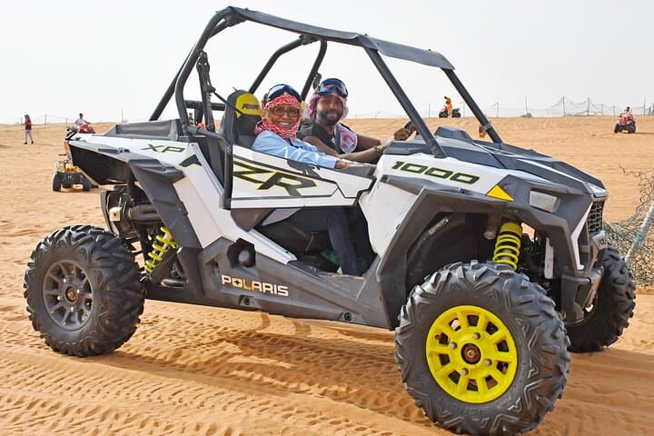 Dubai Evening Buggy Dunes Safari with Sandboarding and Camel Ride