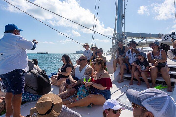 Afternoon Catamaran to Isla Mujeres: Snorkel, Open Bar & Sunset