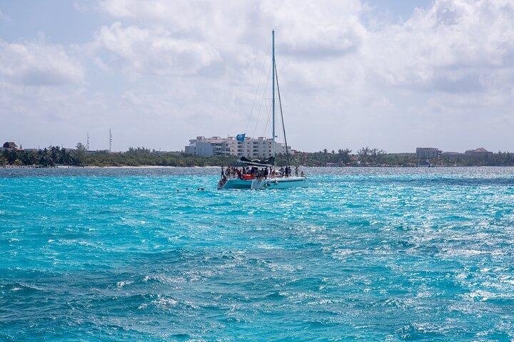 Afternoon Catamaran to Isla Mujeres: Snorkel, Open Bar & Sunset