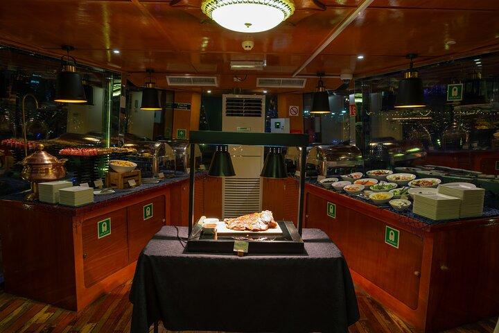 Experience Abu Dhabi Yas Island by Dhow Cruise at Sea with Dinner