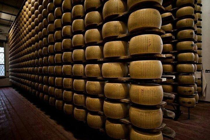 From Reggio Emilia Mediopadana Tour of Parmigiano and Parmaham