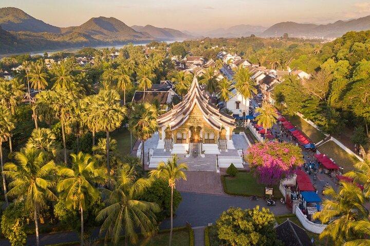 Luang Prabang Alm Giving, Temples and Pak Ou Caves Private Tour