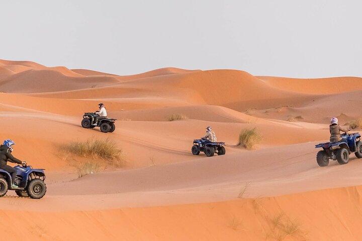 Quad Biking Adventure with Camel and Sand Boarding Tour Abu Dhabi