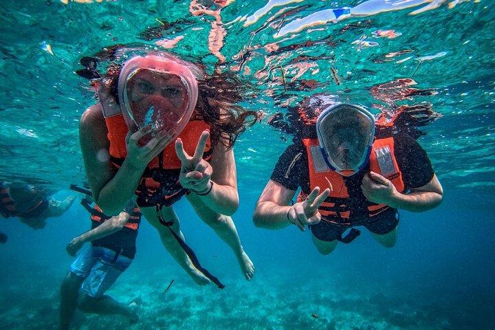 Isla Mujeres Catamaran with Snorkel, Lunch & Unlimited Drinks