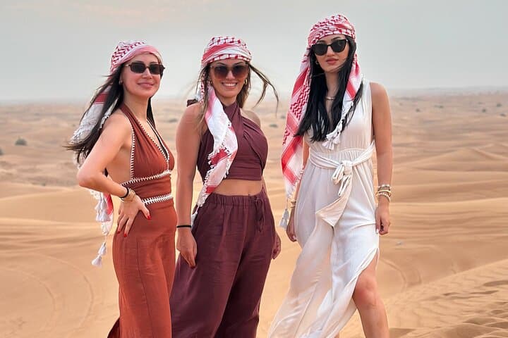Premium Desert Safari Camel Ride with Sandboarding and BBQ Dinner