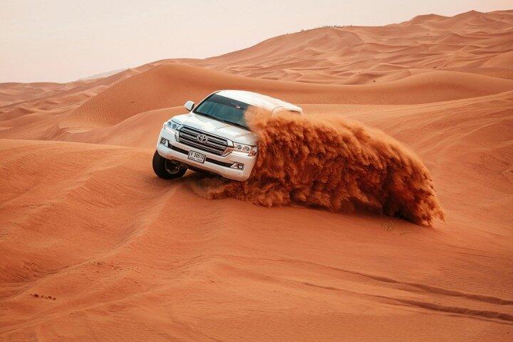Desert Safari Dubai: Quad Bike, Camel Ride, BBQ Dinner & More