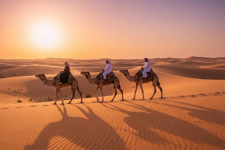 Dubai Desert Safari with Quad Bike Camel Ride Dinner and Shows