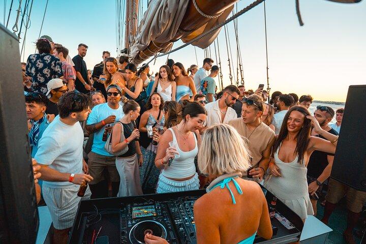 Lisbon Boat Party with Music, Drinks, and Stunning Views.