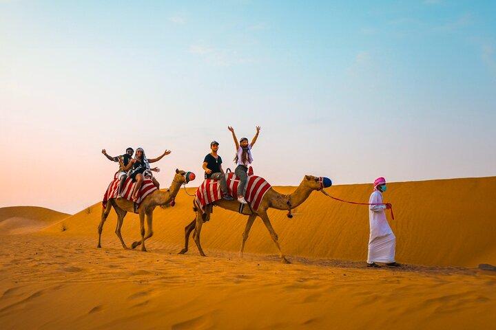 Private Morning Red Dune Safari with Camel Ride & Sandboarding