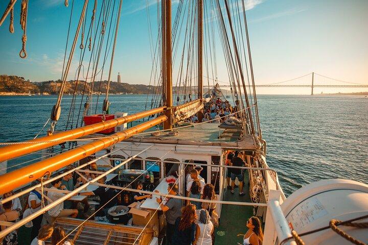 Lisbon Boat Party with Music, Drinks, and Stunning Views.