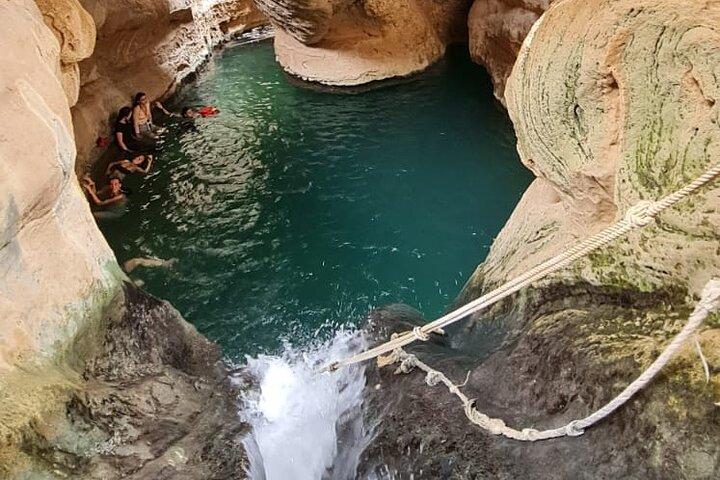 Group Tour to Wadi Shab Hike, Swim, Cave, Sinkhole & Fins Beach