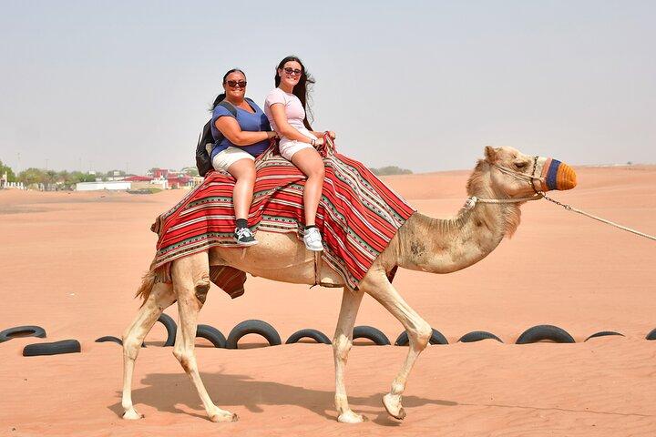 Morning Desert Safari with Quad Bike, Camel Ride & Sandboarding
