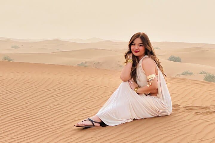 Red Desert safari Dubai with Camel Ride Sand Board & BBQ Dinner