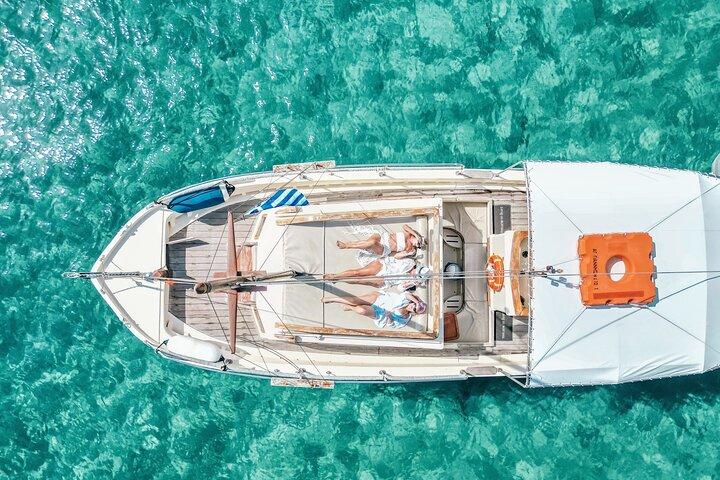Celebrate with a Private Wooden Boat Party in Mykonos
