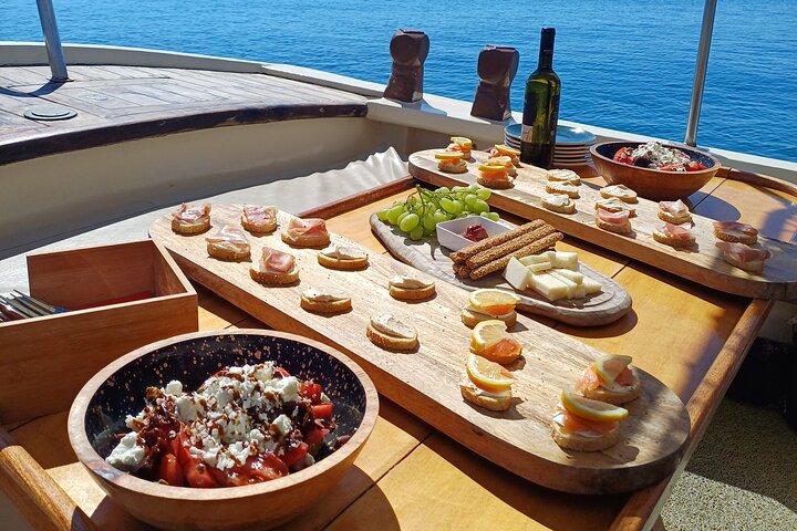 Celebrate with a Private Wooden Boat Party in Mykonos