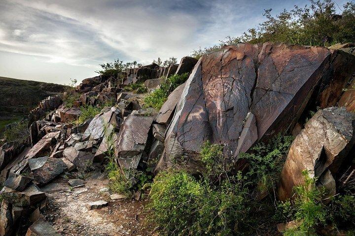 Group tour Tanbaly Ancient petroglyphs UNESCO World Heritage